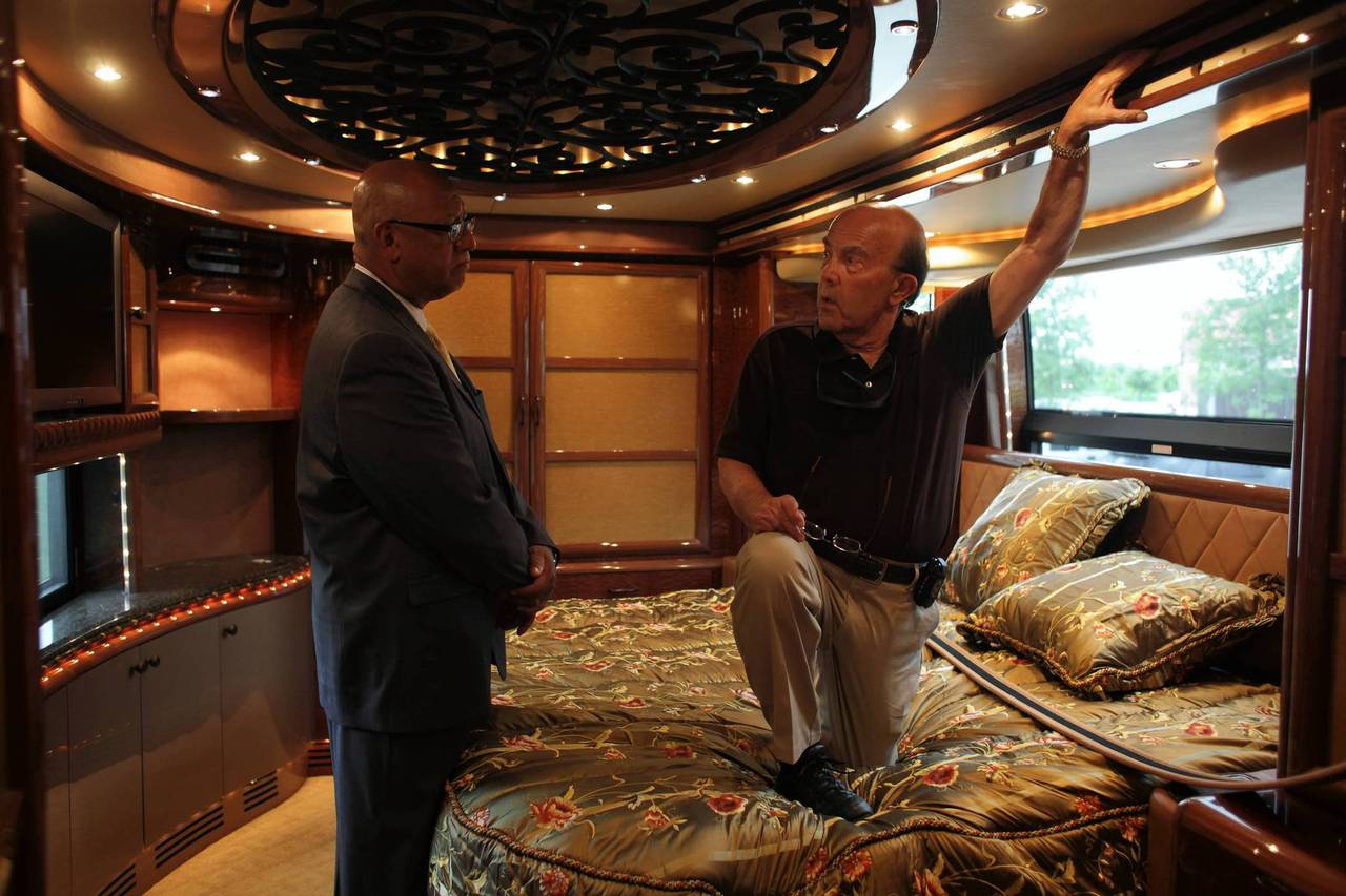 A prospective buyer who did not want to give his name, talks with U.S. Marshall Kevin Carr, left, inside Rita Crundwell's motor home at the Oak Creek Police Department in Oak Creek Wisconsin. — Armando L. Sanchez, Chicago Tribune, July 27, 2012 ritacrundwellmotorhomebedroom.jpg